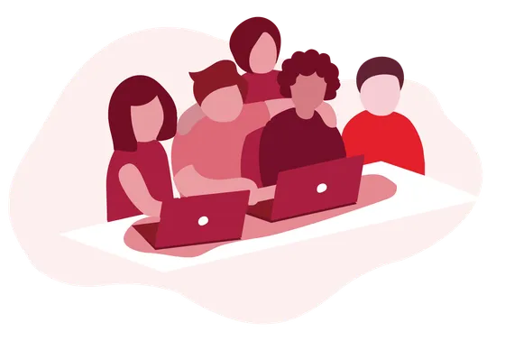 Support team working together on laptops at a shared desk
